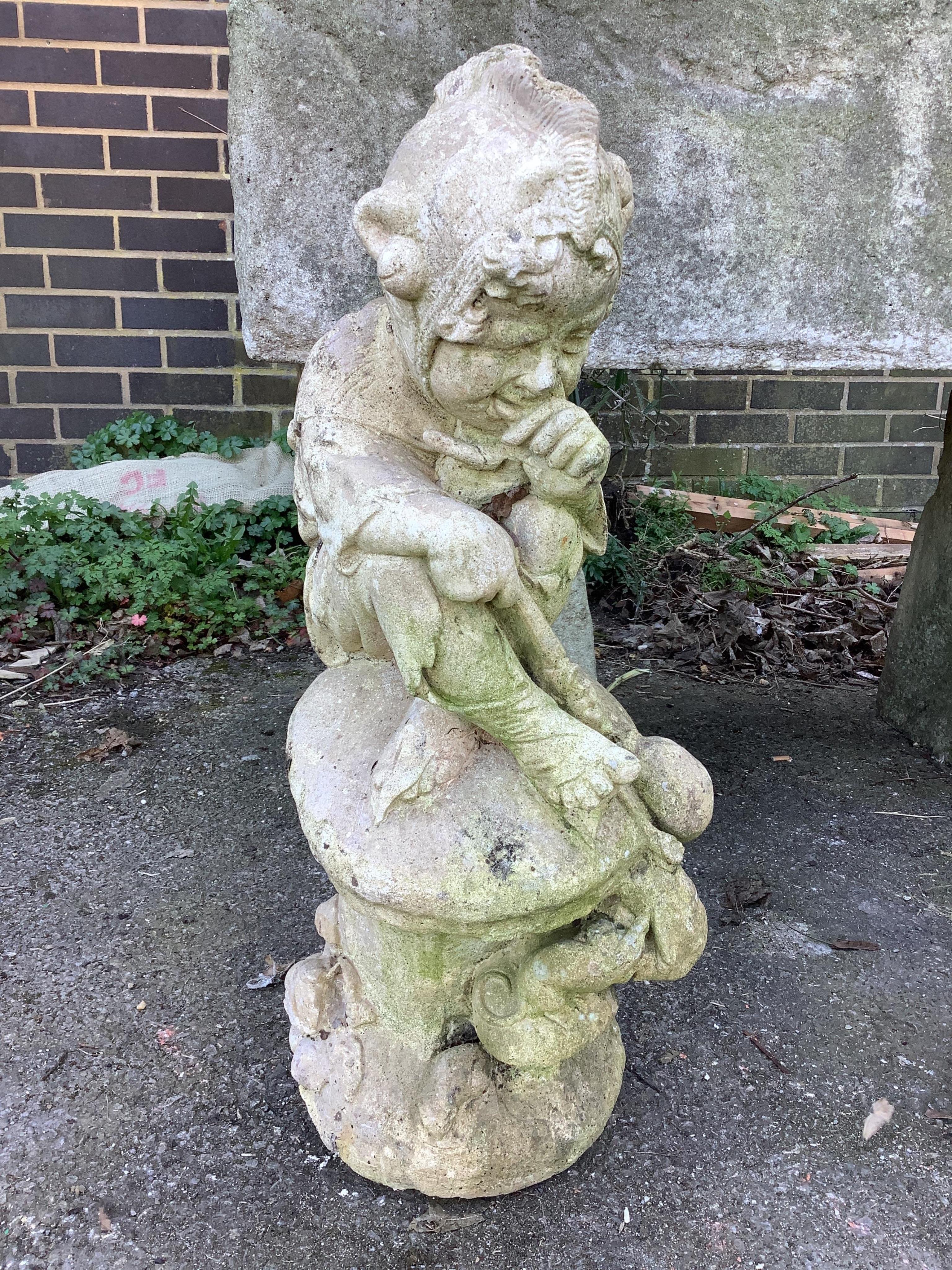 A stone statue of an imp, height 69cm